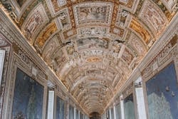 Explore the detailed fresco ceilings of Vatican Museum's breathtaking halls.